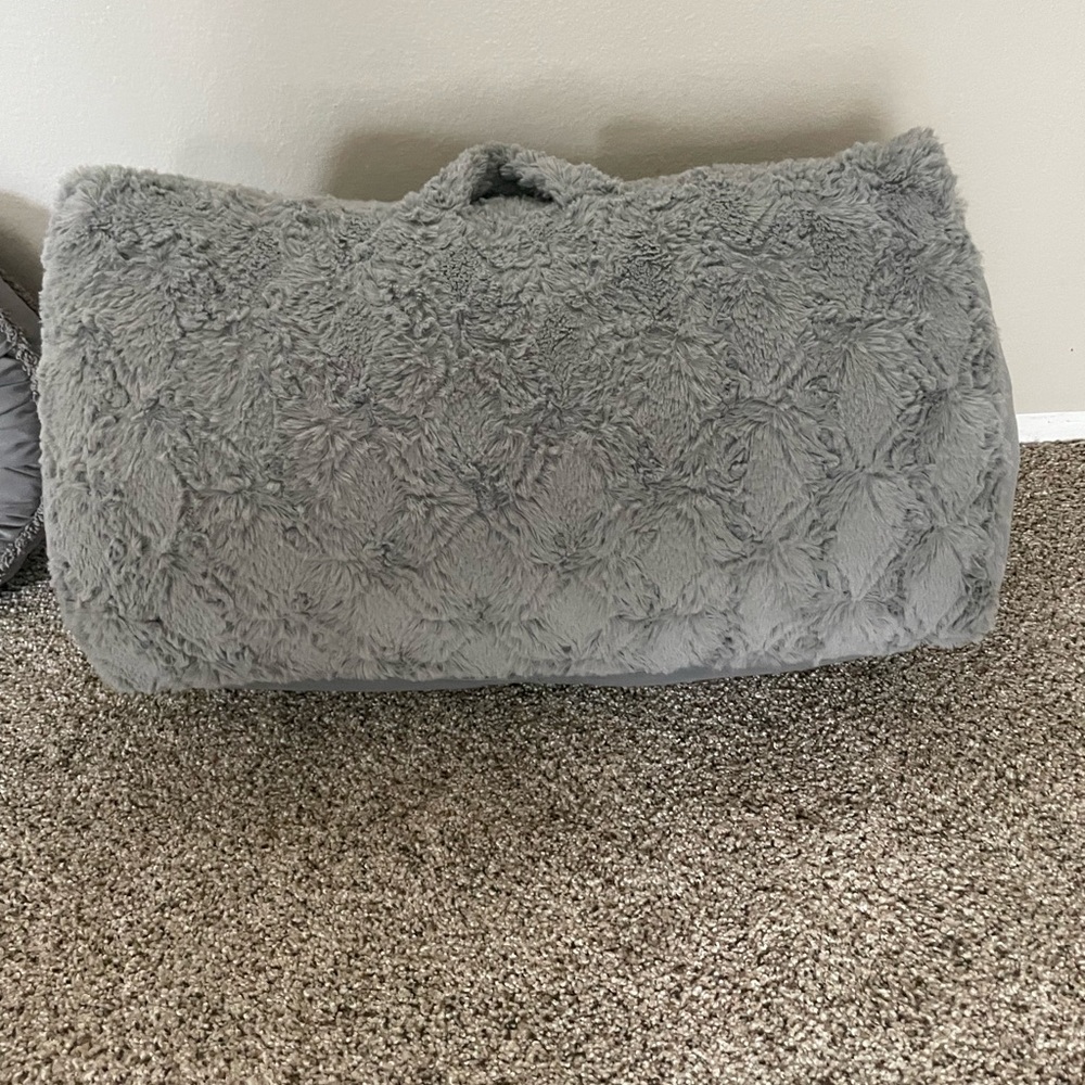 Grey plush back support pillow